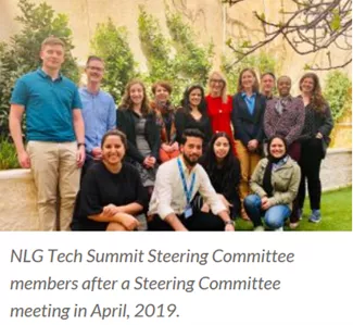 The NLG Tech Summit Steering Committee is standing in a garden, with one row of people squatting down and one row standing up 