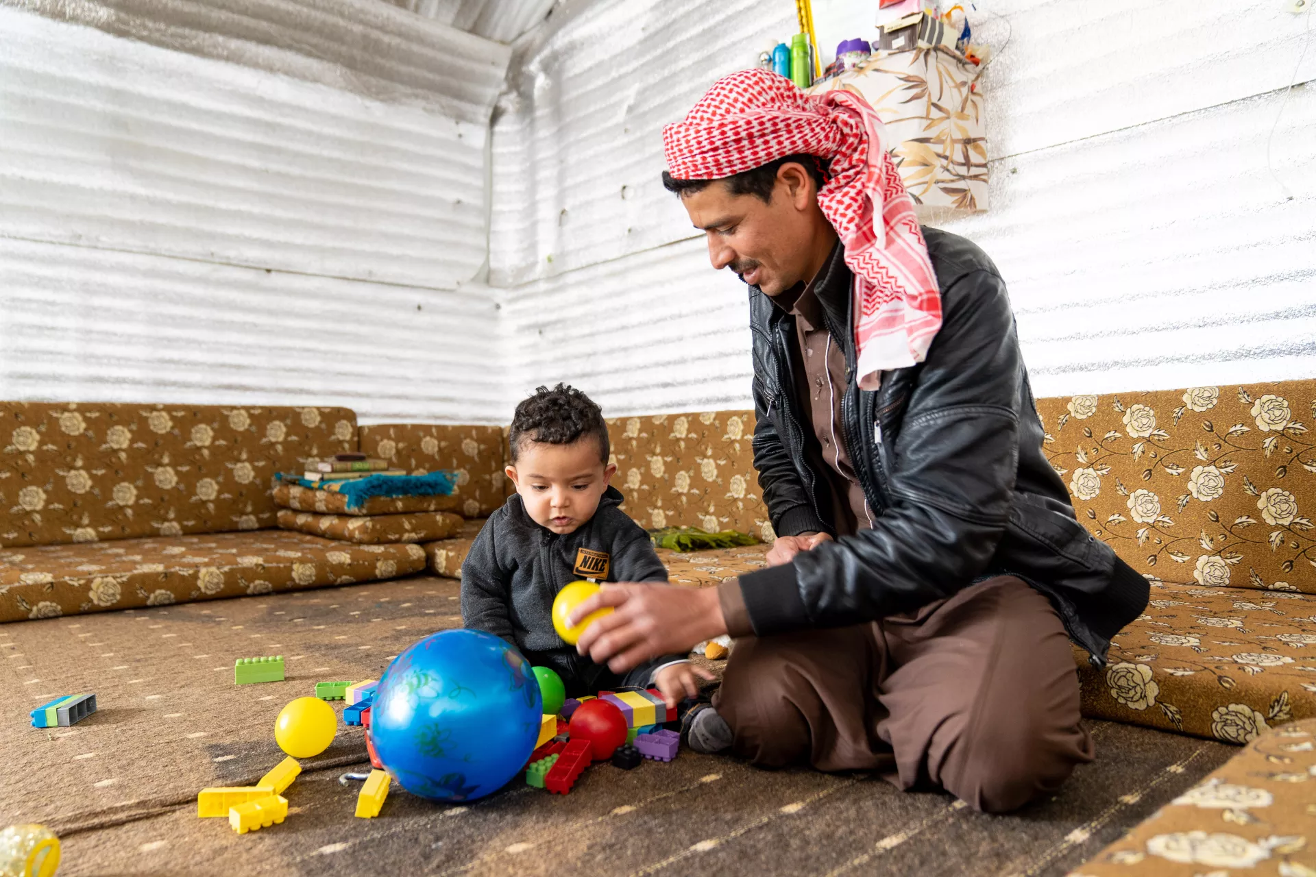 Baby Mohammad is celebrating his first birthday in Azraq Refugee Camp. He was born in the UNICEF-supported pediatric ward in the camp and for his first birthday, he is receiving his latest vaccination in one of the camp’s health centres, also supported by UNICEF.
