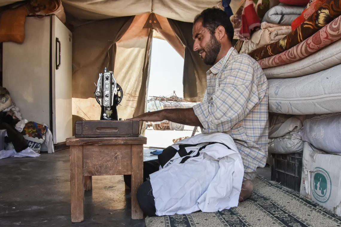 Busy sewing away, Nader keeps up with a growing number of orders