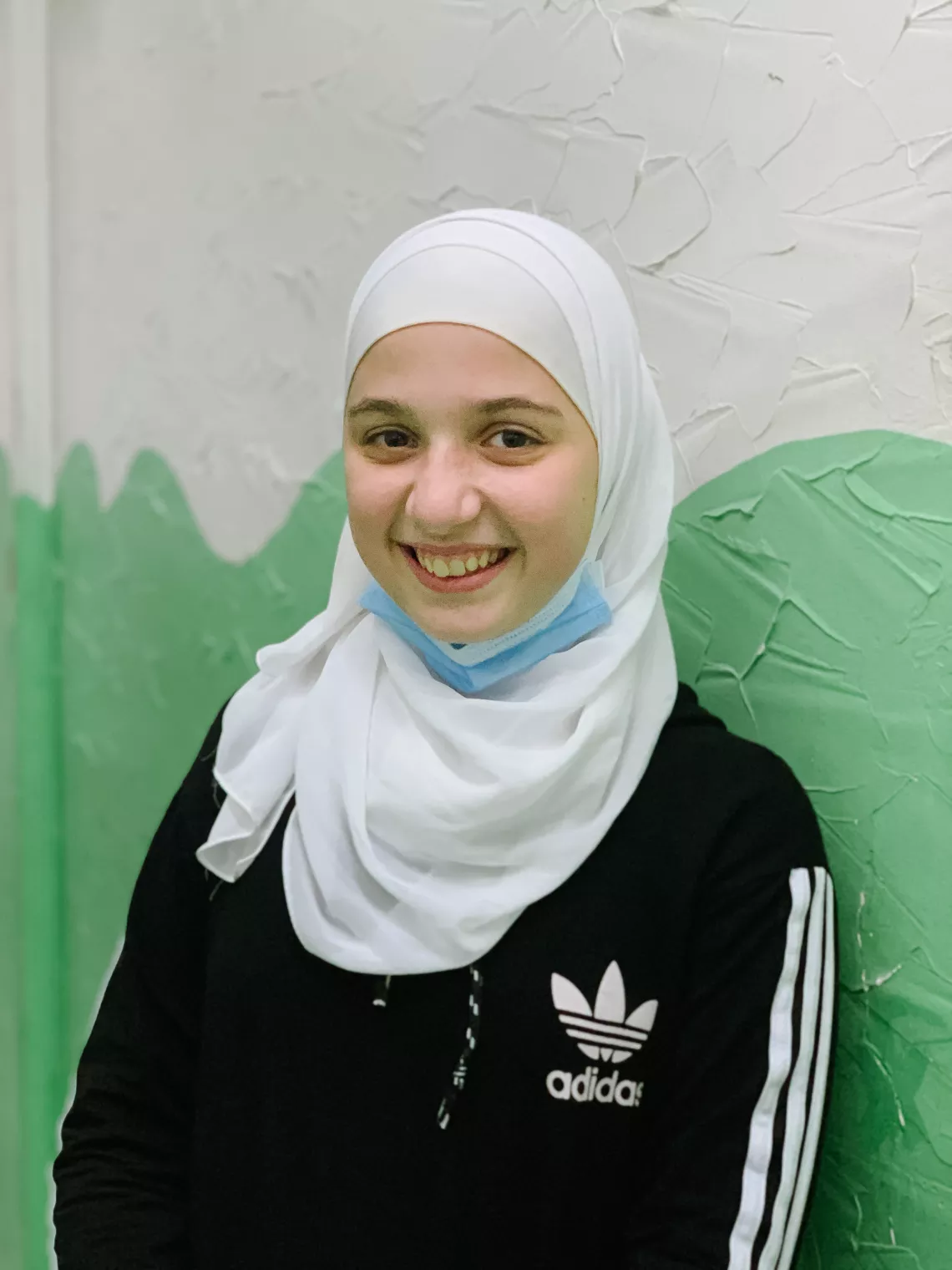 Portrait of a young girl wearing a hijab